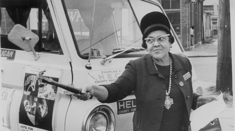 Mrs. Lelia I. Francis ran against C. J. McLin Jr. for the 88th district of the Ohio State house of Representative. Francis tried to get McLin to debate her. When all else failed she went to his office with a hammer ‘to nail his voting record to his door.’ McLin came outside for a sidewalk debate. Contributed photo from Nov. 3, 1968