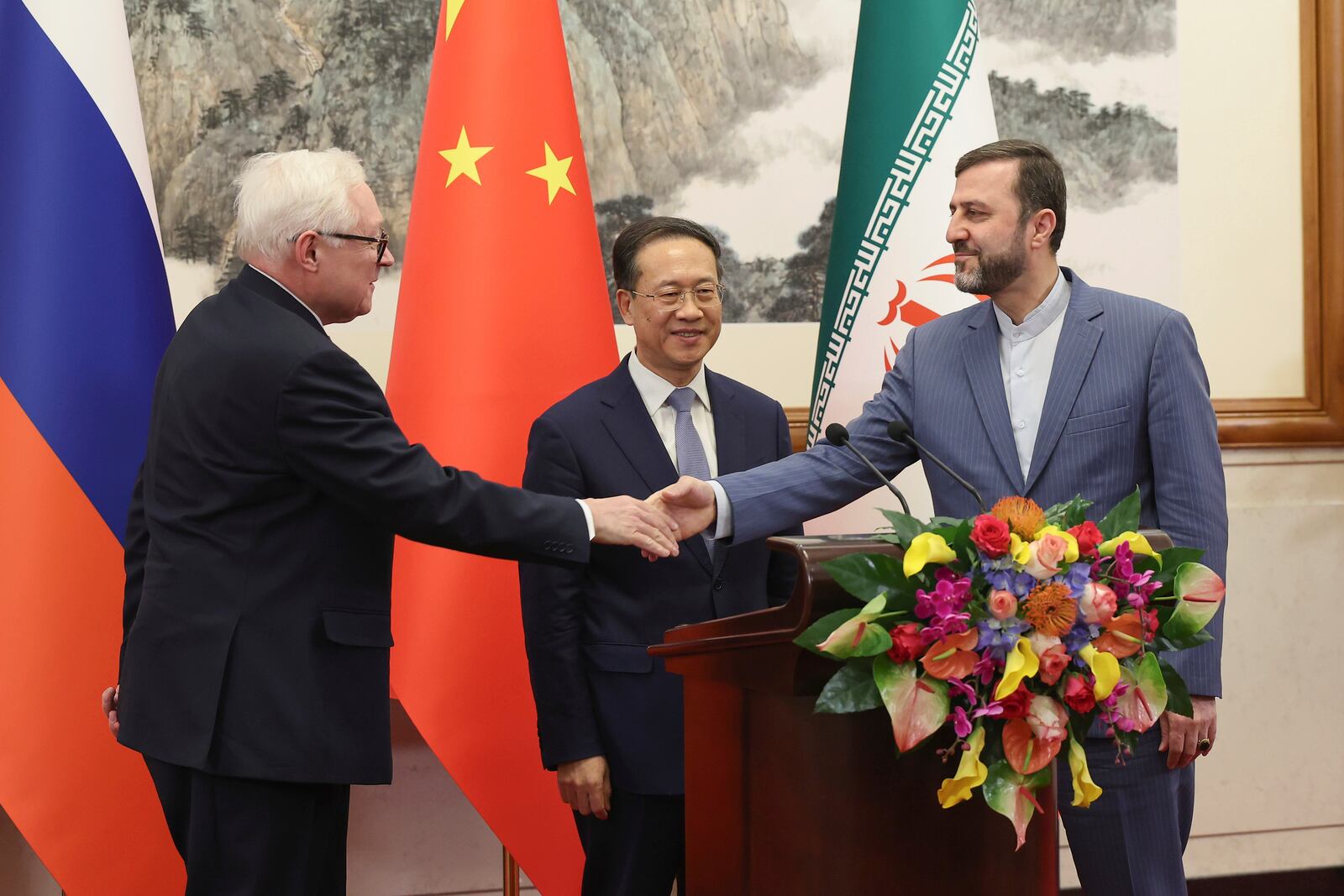 FILE - Russian Deputy Foreign Minister Sergei Ryabkov, from left, Chinese Vice Foreign Minister Ma Zhaoxu and Iranian Deputy Foreign Minister Kazem Gharibabadi, meet with reporters after their meeting at Diaoyutai State Guest House March 14, 2025, in Beijing. (Lintao Zhang/Pool Photo via AP, File)