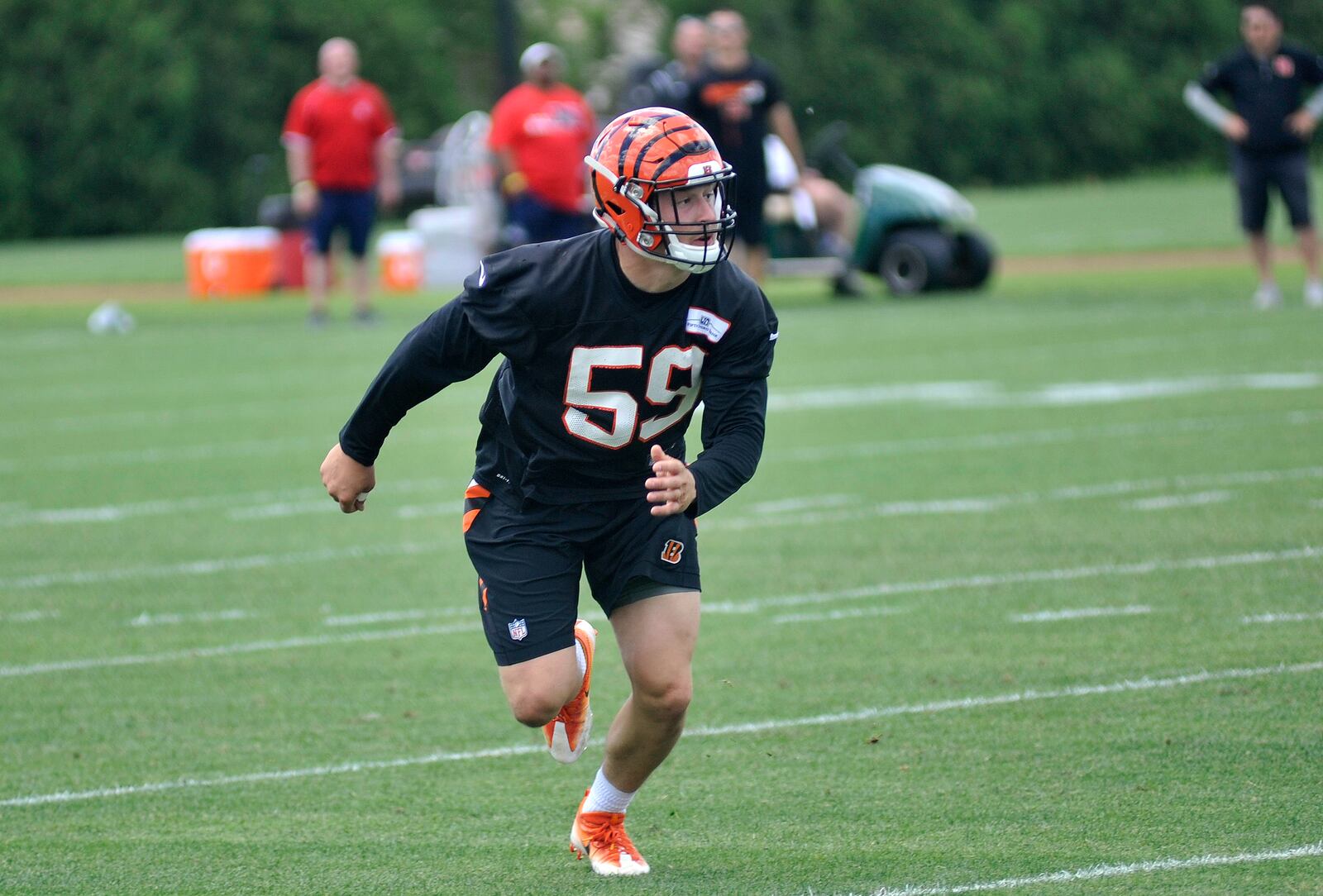 Cincinnati Bengals linebacker Nick Vigil pursues a play during OTA practice Tuesday, May 30, at Paul Brown Stadium. JAY MORRISON/STAFF