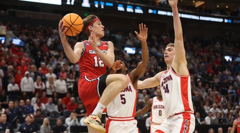 Dayton's Petras Padegimas makes a pass against Arizona in the second round of the NCAA tournament on Saturday, March 23, 2024, at the Delta Center in Salt Lake City, Utah. David Jablonski/Staff