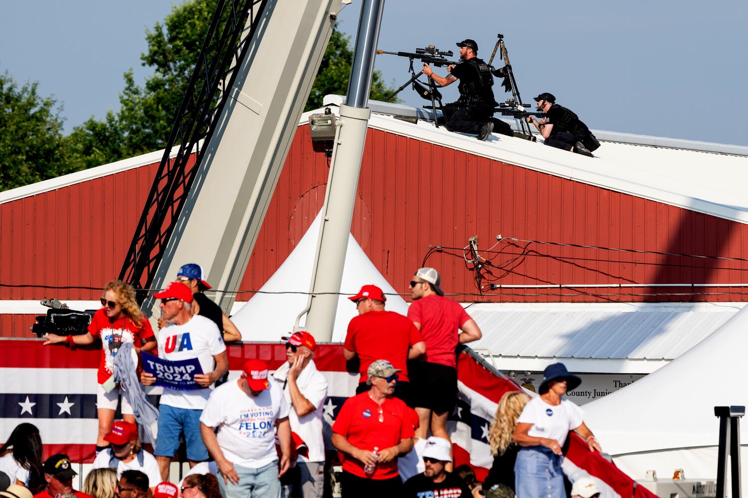 Secret Service snipers and audience members react after shots are fired while former President Donald Trump speaks at a campaign rally in Butler, Pa., July, 13, 2024.   (Eric Lee/The New York Times)