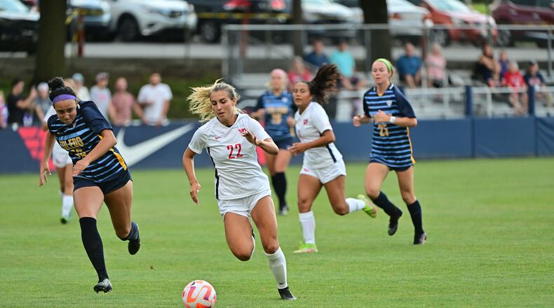 Dayton's Itala Gemelli dribbles against Toledo on Aug. 18, 2022, at Baujan Field. Photo by Erik Schelkun