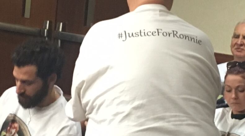 A courtroom attendee shows his support Monday for Ronnie Bowers, who died after being shot in Kettering Sept. 4 shortly after leaving AlterFest. NICK BLIZZARD/STAFF