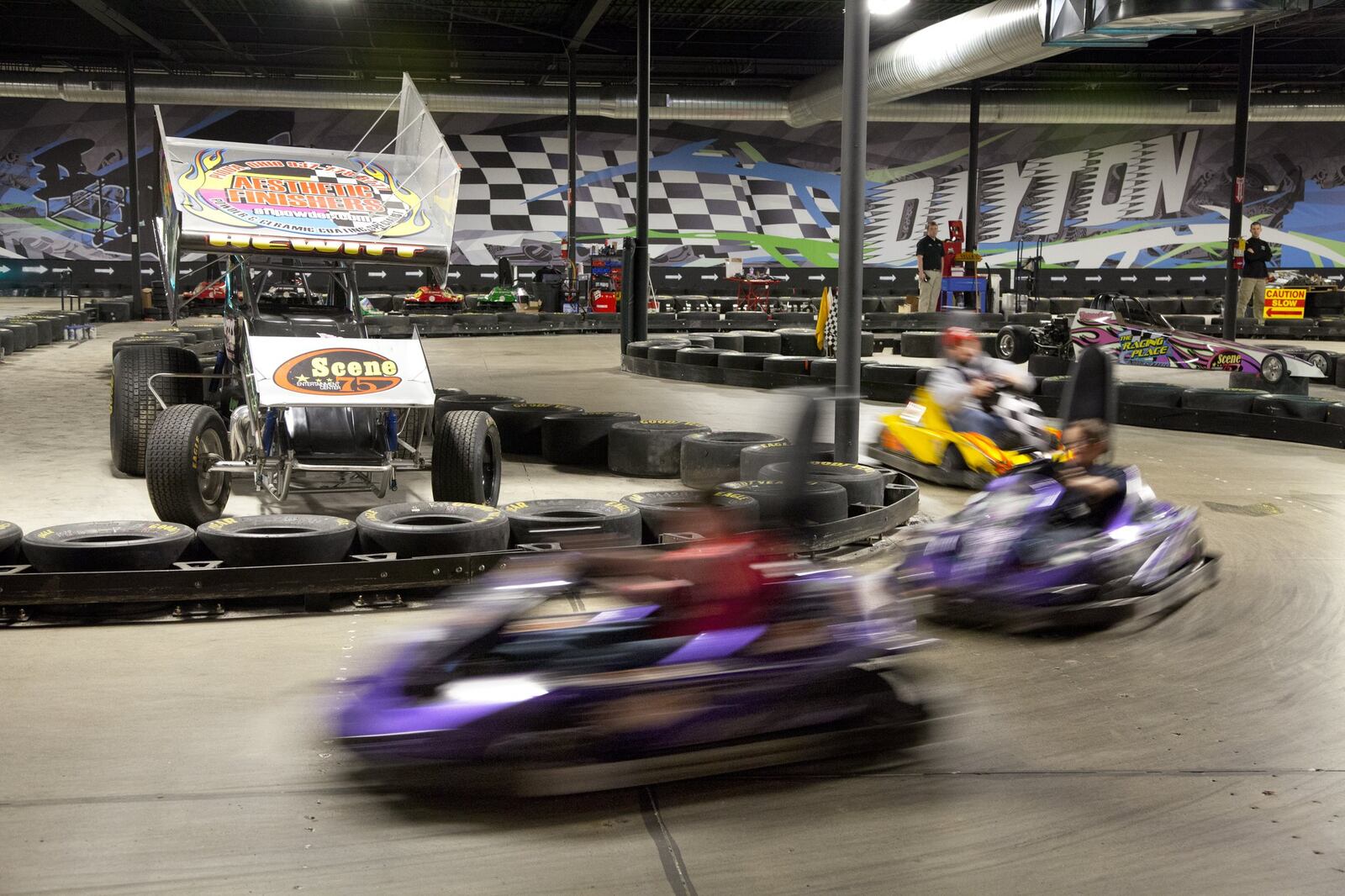 Electric go-carts zip around the track at Scene75, a perfect destination for indoor family fun. TY GREENLEES/STAFF