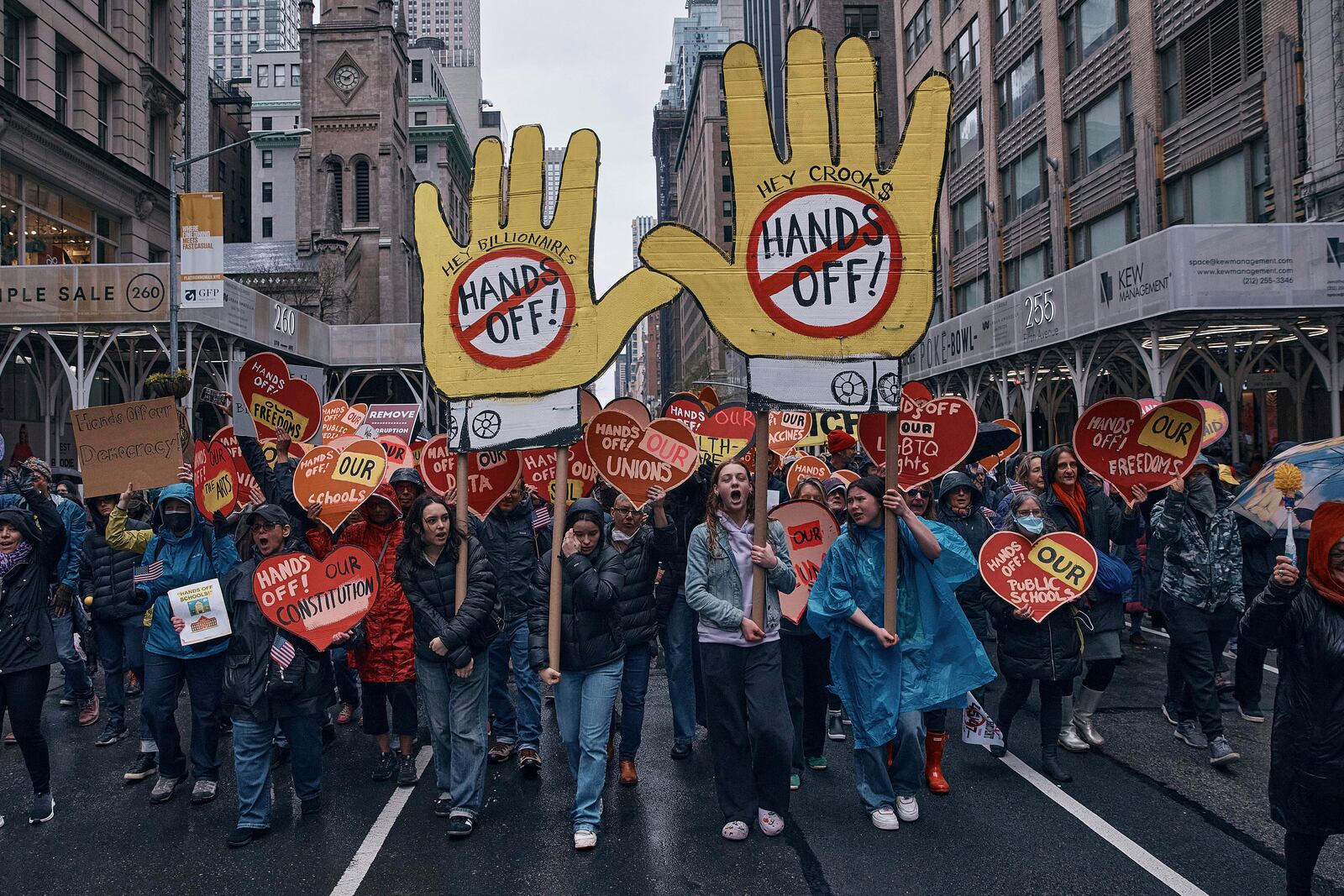 Protestors shout slogans as they take to the streets and march during a "Hands Off!" protest against President Donald Trump on Saturday, April 5, 2025, in New York. (AP Photo/Andres Kudacki)