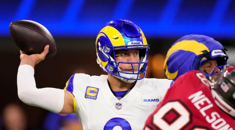 Los Angeles Rams quarterback Matthew Stafford (9) passes against the Tampa Bay Buccaneers during the first half of an NFL football game, Sunday, Nov. 23, 2025, in Inglewood, Calif. (AP Photo/Mark J. Terrill)