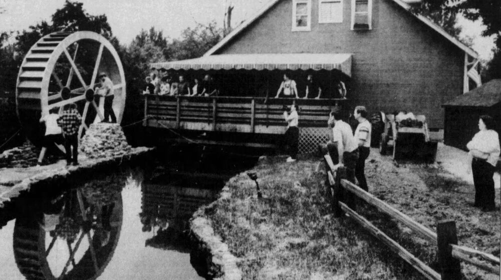 Clifton Mill water wheel installation, 1988. DAYTON DAILY NEWS ARCHIVES.