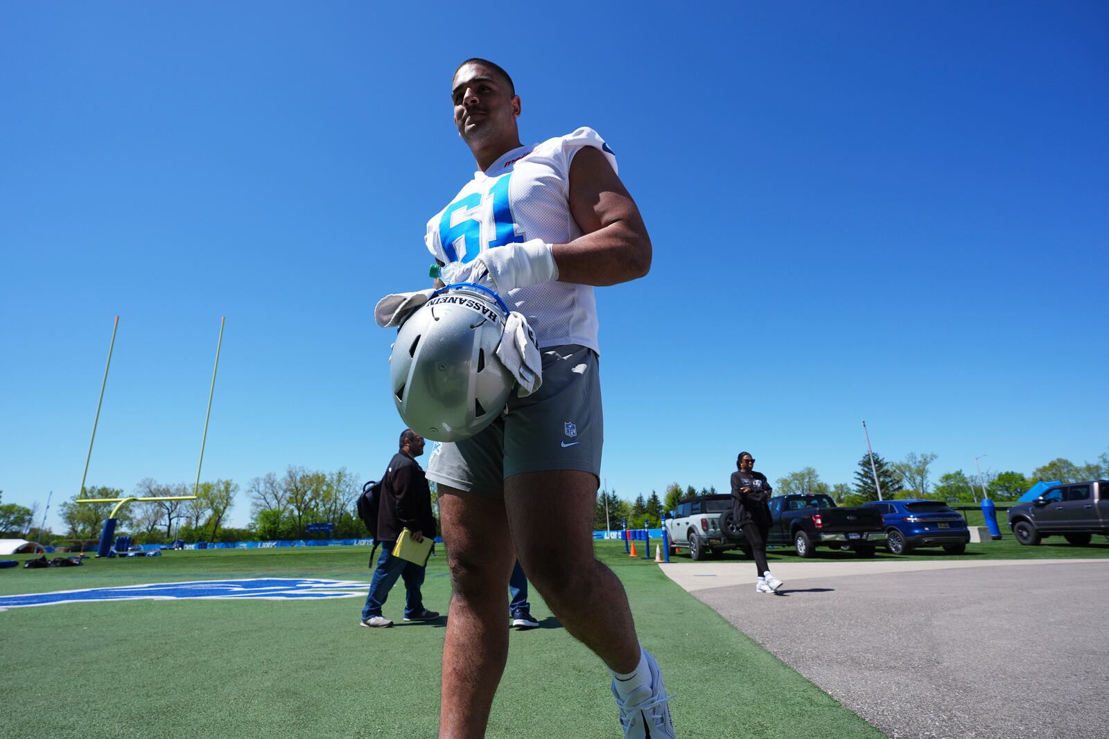 Detroit Lions defensive lineman Ahmed Hassanein (61) walks off the field after the NFL football team's rookie minicamp in Allen Park, Mich., Friday, May 9, 2025. (AP Photo/Paul Sancya)