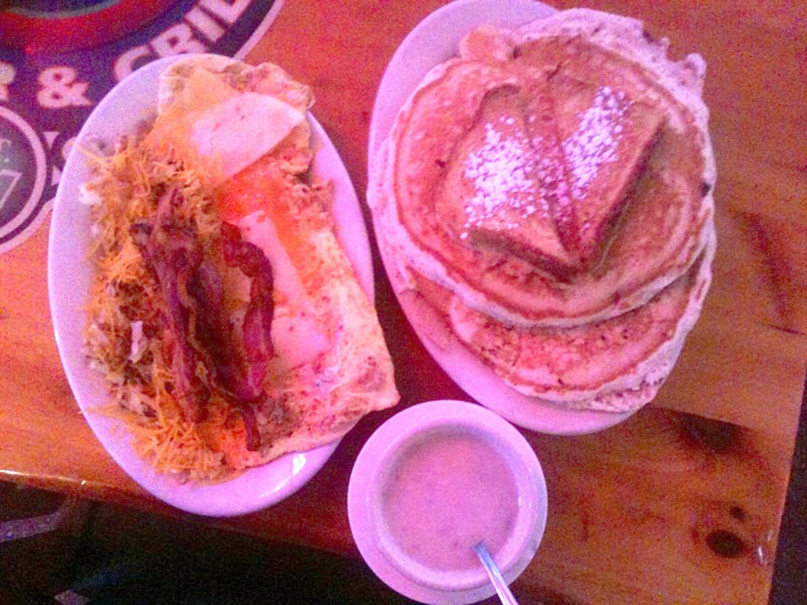 We are betting you can’t finish The Gambler - two pancakes, one slab of french toast, bacon and hash brown and a ‘girle’ size omelet. Pictured with sausage gravy.