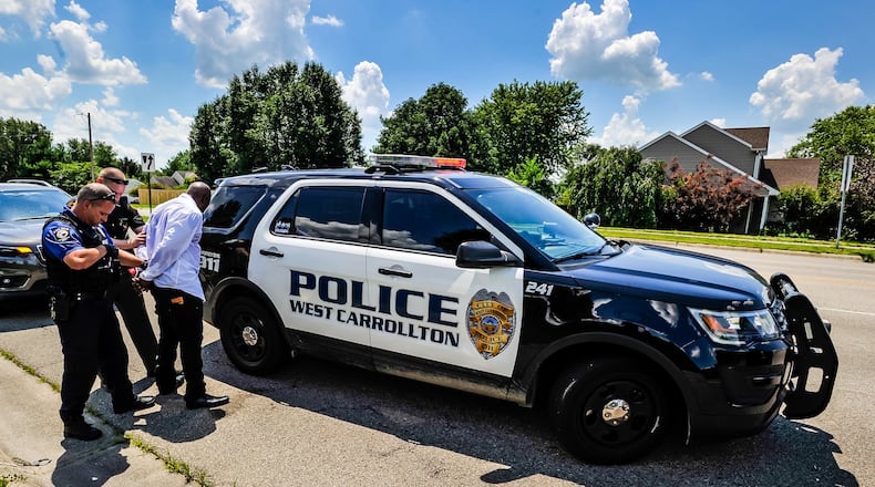 A recent Wright State University survey found more than 90 percent of West Carrollton residents were either very satisfied or satisfied with police services. In June, West Carrollton police apprehended a bank robbery suspect. FILE