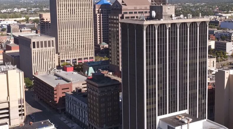 The Grant-Deneau Tower, the tall building in the forefront, has won state historic tax credits.  TY GREENLEES / STAFF