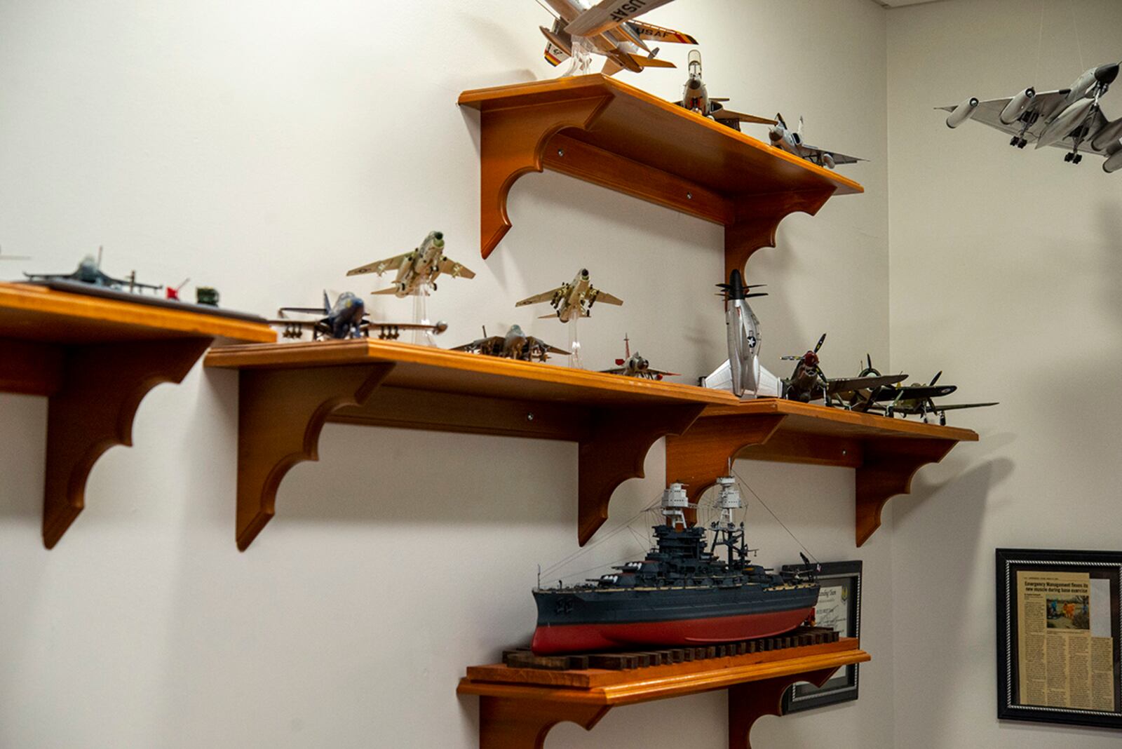 A collection of models built by David Frank, the 788th Civil Engineer Squadron’s Emergency Management chief, sits on display April 6 in Building 15 at Wright-Patterson Air Force Base. He put together a new set for the 80th anniversary of the Doolittle Raid, in which 16 B-25s took off from the USS Hornet on April 18, 1942, and performed bombing strikes on Tokyo during World War II. U.S. AIR FORCE PHOTO/SENIOR AIRMAN JACK GARDNER