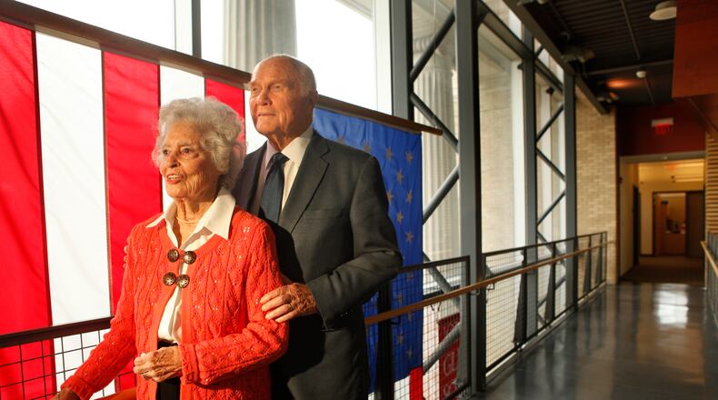 John and Annie Glenn in a walkway inside the John Glenn School of Public Affairs on the Ohio State University campus in 2011. Staff Photo by Jim Witmer