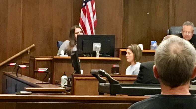 Melissa “Missy” St. John on the witness stand Thursday during the murder trial of her son, Ryan “Luke” St. John. MARK GOKAVI/Staff