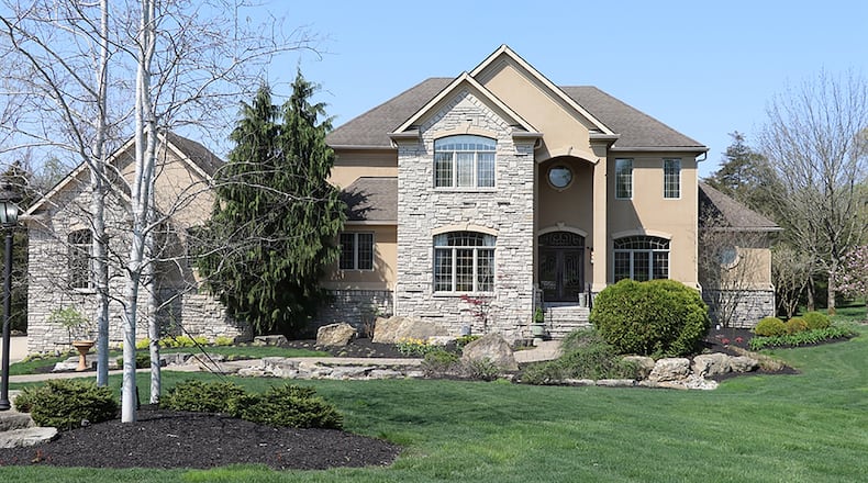 The custom-built Homearama home from 2003 includes about 7,550 sq. ft. of living space with a first-floor main suite, sun room and lower level with home theater and wine cellar. The home also has a side-entry, 3-car garage. CONTRIBUTED PHOTO