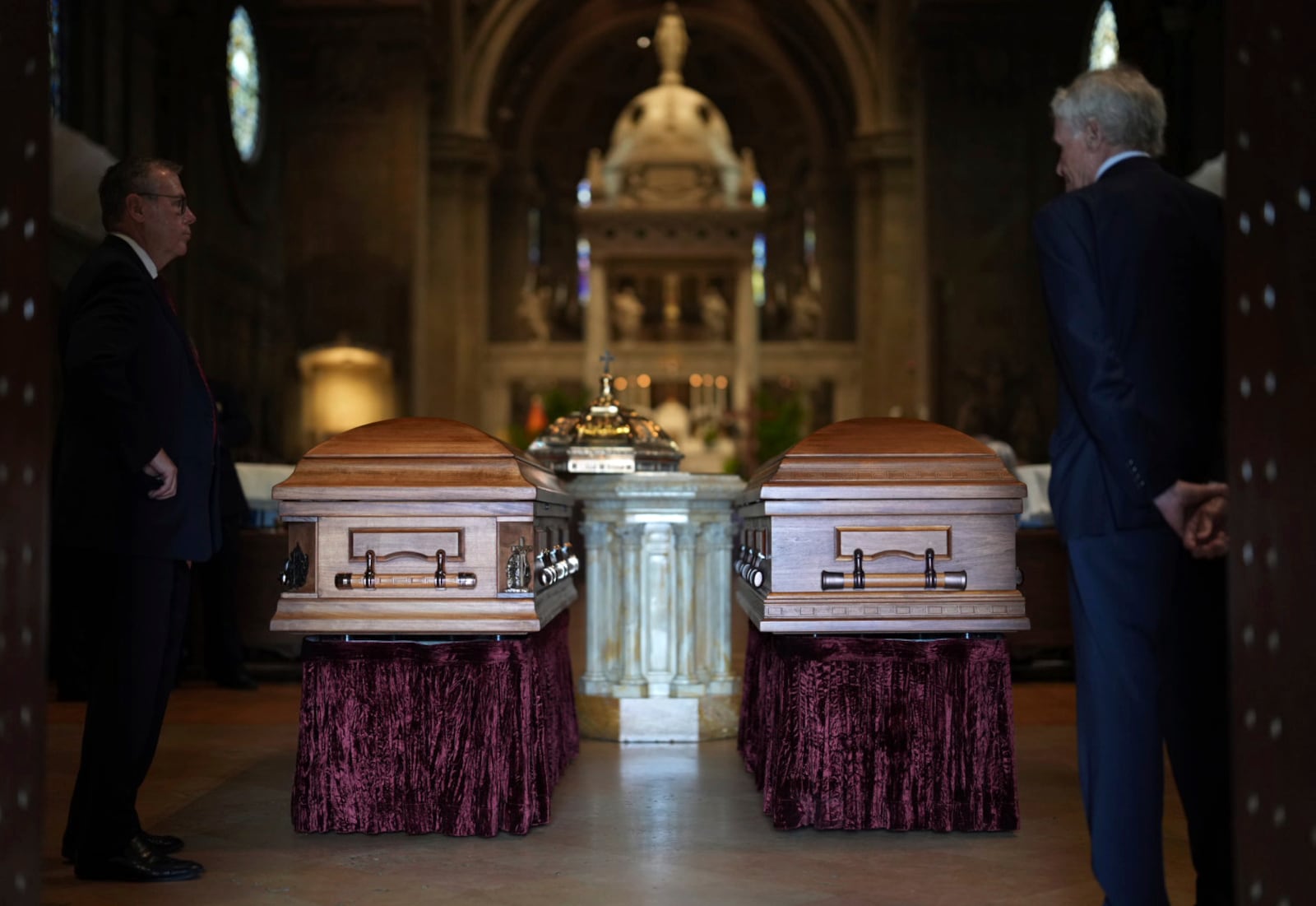 The caskets of Melissa and Mark Hortman sit at the back of the sanctuary before funeral services for Mark and Melissa Hortman at the Basilica of St. Mary in Minneapolis, Minn., on Saturday, June 28, 2025. (Alex Kormann/Star Tribune via AP, Pool)