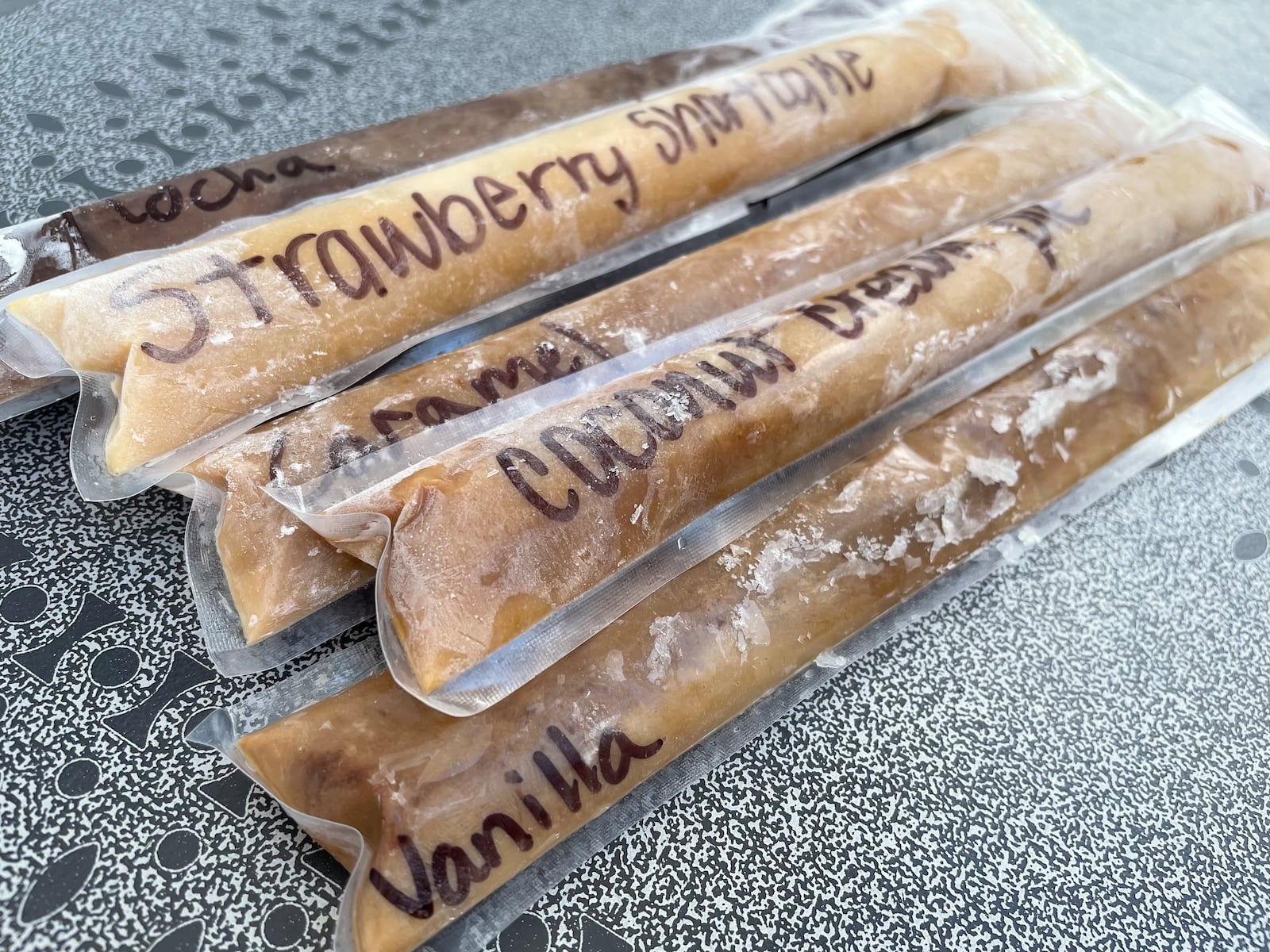Since opening in October, Taylor’s Coffee & Creamery in Waynesville has added several new items to their menu including latte popsicles. NATALIE JONES/STAFF