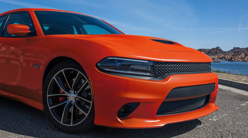 The 2017 Dodge Charger SXT has all the looks of a muscle car with ample power, but also adds all-wheel drive practicality and keeps this car in contention as a decent choice of a family vehicle. (Dodge photo)