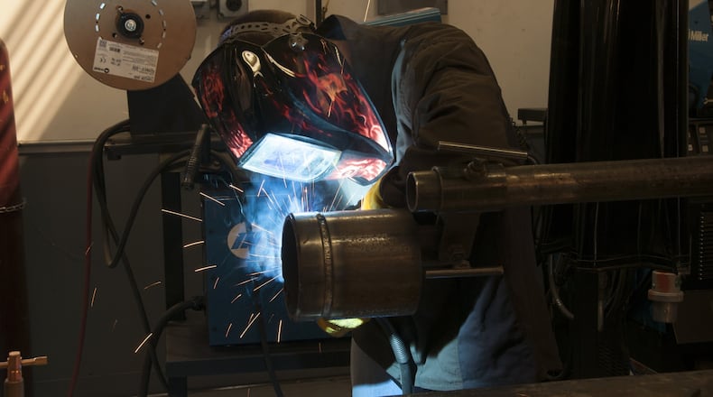 A welder at work in Hobart Filler Metals’ Applications Engineering Lab. The company is celebrating its 100th anniversary. CONTRIBUTED.