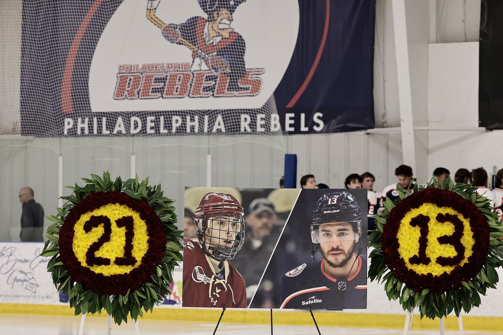 FILE - The late Matthew and Johnny Gaudreau are honored before the Philadelphia Rebels' home opener at Hollydell Ice Arena in Sewell, N.J. on Friday, Sept. 13, 2024. (Elizabeth Robertson/The Philadelphia Inquirer via AP, File)