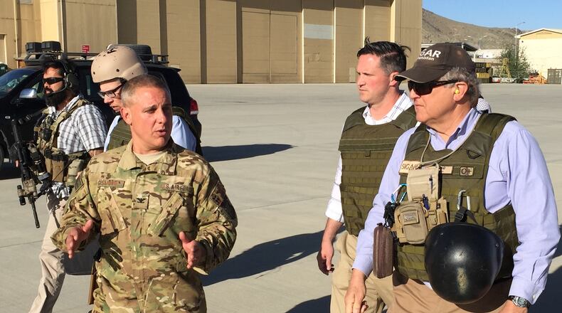 John Sopko, right, wearing the SIGAR hat, on the tarmac in Kabul, Afghanistan. Contributed