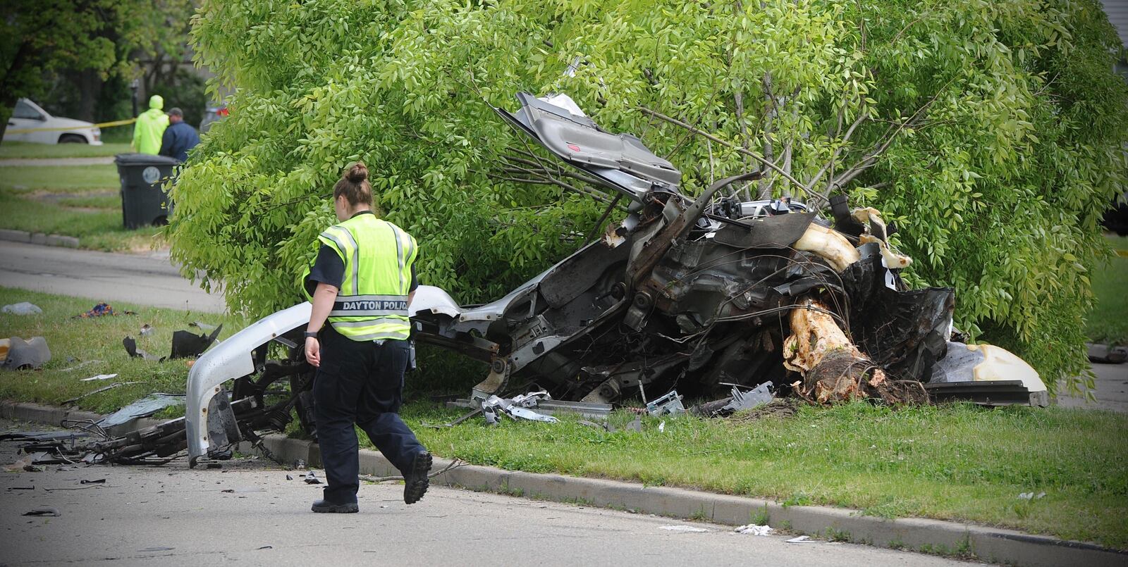 A vehicle broke in half after hitting a tree near South Gettysburg Avenue and Nicholas Road on Tuesday, May 11, 2021. MARSHALL GORBY/STAFF