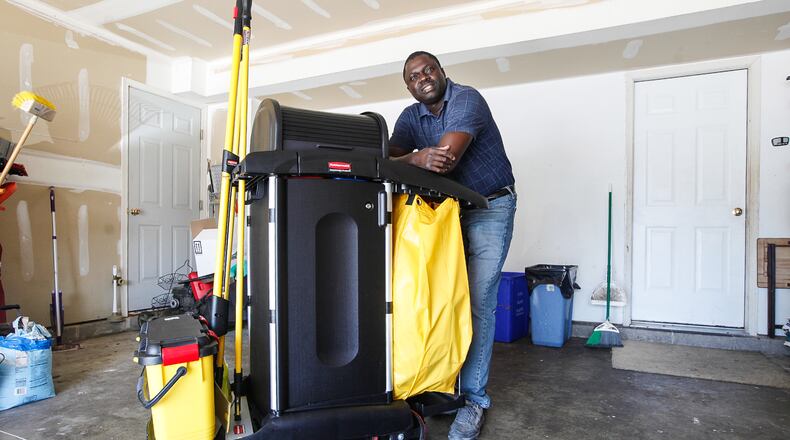 Omar Mbengue, pictured, and his wife, Ndeye, have a family-owned small business, Relaxa Cleaning Services. The company was among the first recipients of coronavirus relief small business grants distributed by the Montgomery County Office of CARES Act. CHRIS STEWART / STAFF