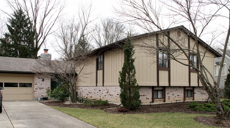 The tri-level brick home has about 2,760 square feet of living space with a finished lower level and 2-car garage. CONTRIBUTED PHOTOS BY KATHY TYLER