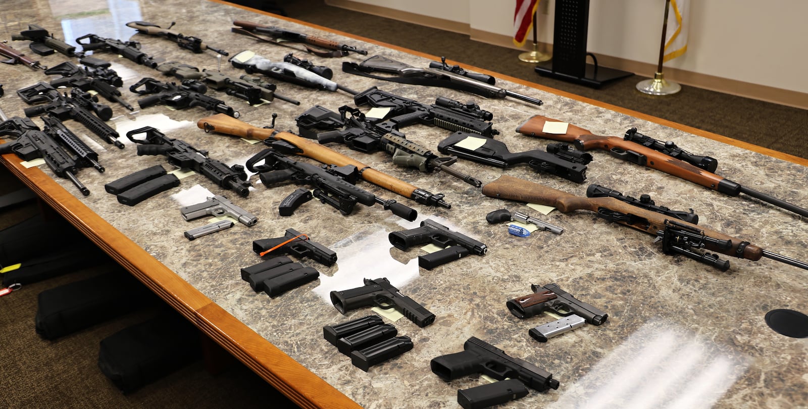 Several guns and ammunition recovered from a house in Harrison Twp. over the summer.

CONTRIBUTED / MONTGOMERY COUNTY SHERIFF'S OFFICE.
