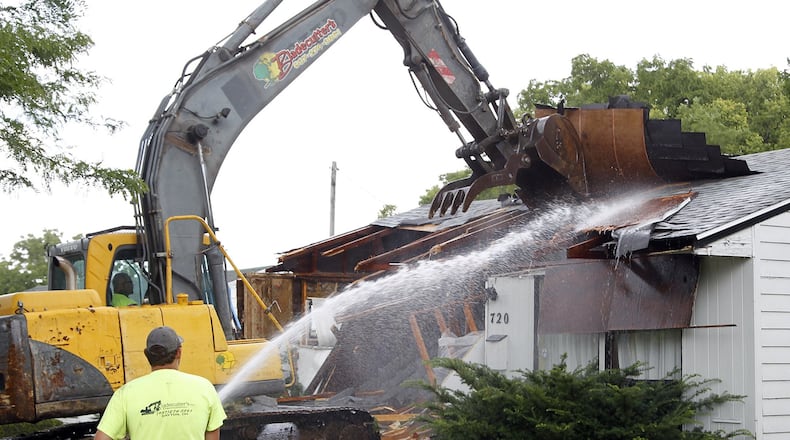 Bladecutters Inc. is tearing down houses for the Montgomery County Land Bank and also does work for the city of Dayton. The company is a small business that is certified through the U.S. Housing and Urban Development to participate in public contracting programs. Until recently it was certified in Dayton’s Procurement Enhancement Plan as a Women’s Business Enterprise but has outgrown that program because it has been so successful. This house at 720 La Salle Dr. in Dayton was taken down last week. TY GREENLEES / STAFF
