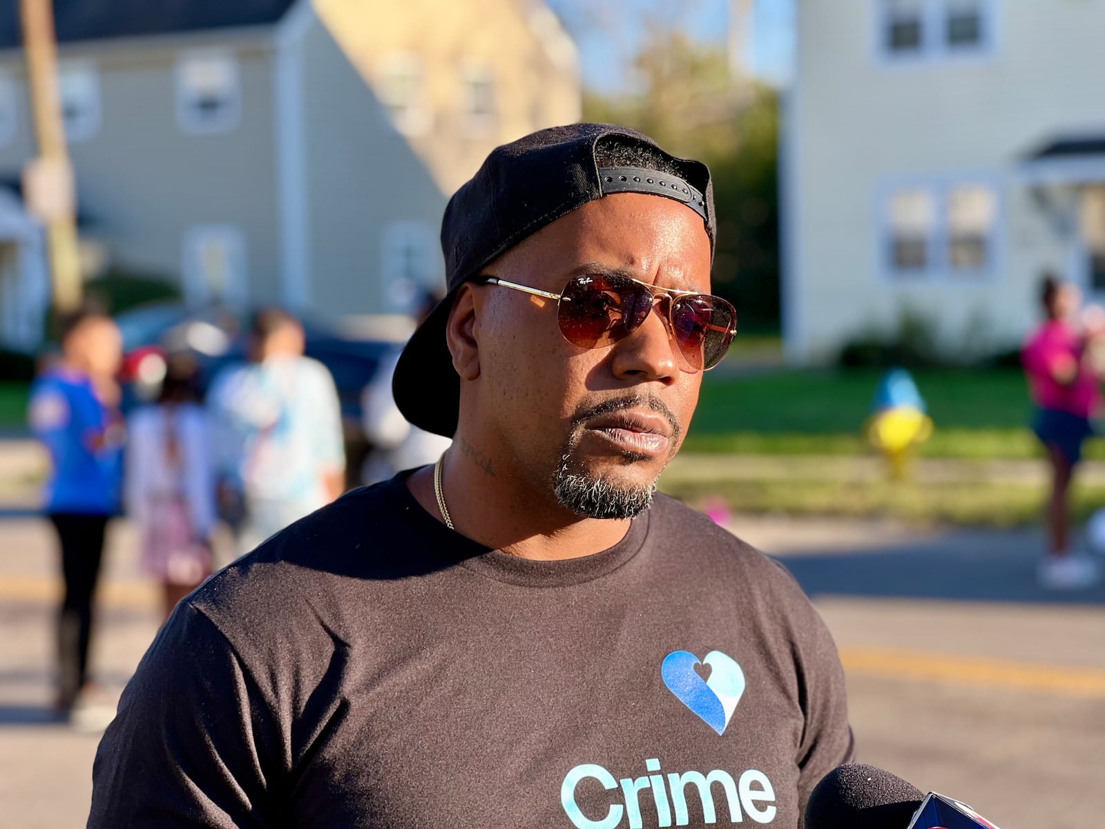Dion Green, a survivor of the Oregon District mass shooting and founder of the nonprofit Fudge Foundation, attended Sunday's memorial for Legaci Deshawn Taylor, who was killed in a shooting by an unknown gunman Friday evening.