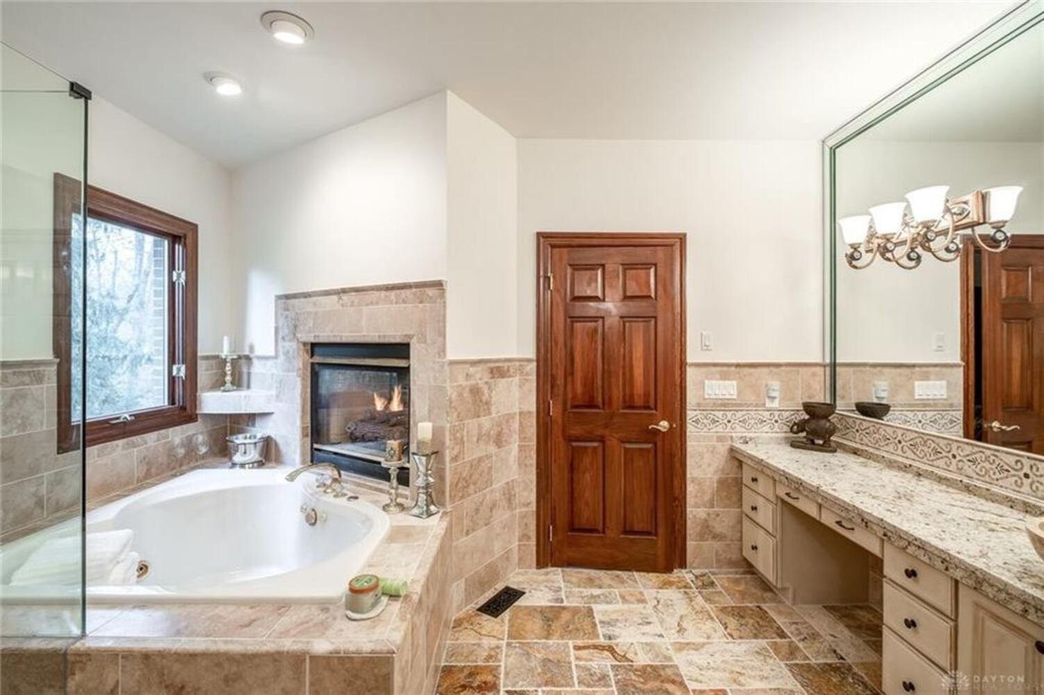 French country-style home offers grand social areas