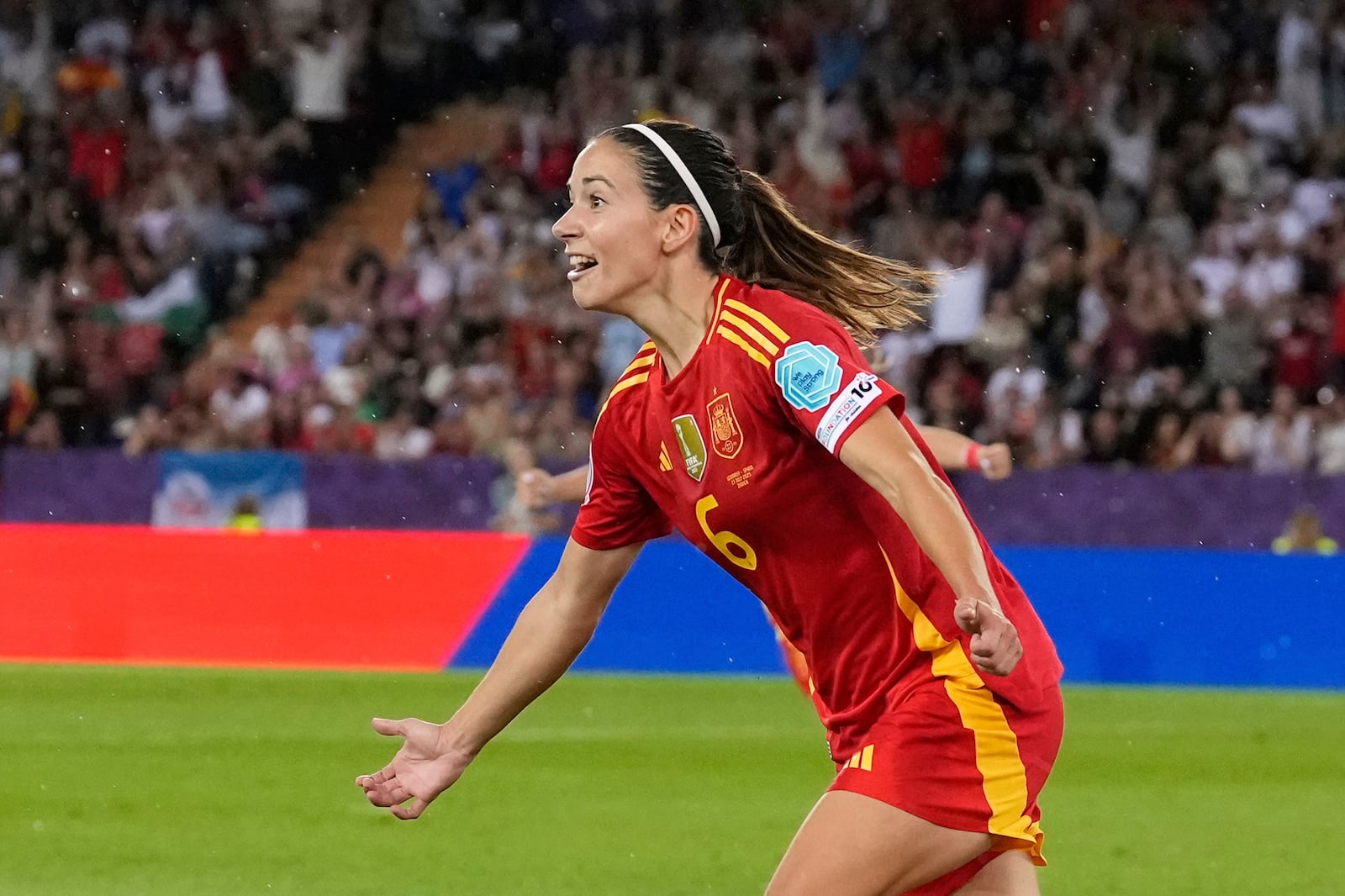 Spain's Aitana Bonmati celebrates after scoring the opening goal during the Women's Euro 2025 semifinals soccer match between Germany and Spain at Stadion Letzigrund in Zurich, Switzerland, Wednesday, July 23, 2025. (AP Photo/Alessandra Tarantino)