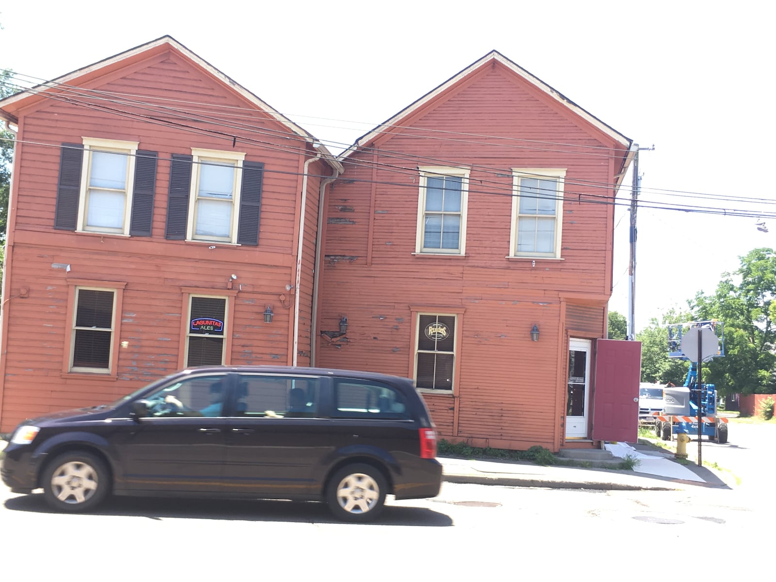 Brian Ferguson, the owner of Zada Paint Works, said he loves painting some of the city's oldest buildings.  His work includes the South Park Tavern building.  This photo was taken before Ferguson applied paint.