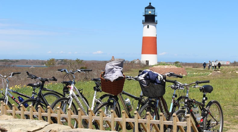 Sankaty Head Light (1850) and nearby ‘Sconset Beach are destinations for bicyclists who explore the island via Polpis Road, one of several popular bike routes. (Alan Solomon/Chicago Tribune/TNS)