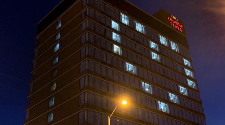 A beacon of love - a message during the coronavirus pandemic -  is beaming from the Crowne Plaza Hotel in downtown Dayton. LISA POWELL / STAFF