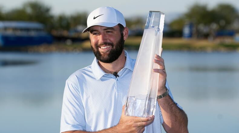 Scottie Scheffler smiles after winning the American Express golf event on the Pete Dye Stadium Course at PGA West Sunday, Jan. 25, 2026, in La Quinta, Calif. (AP Photo/Ross D. Franklin)
