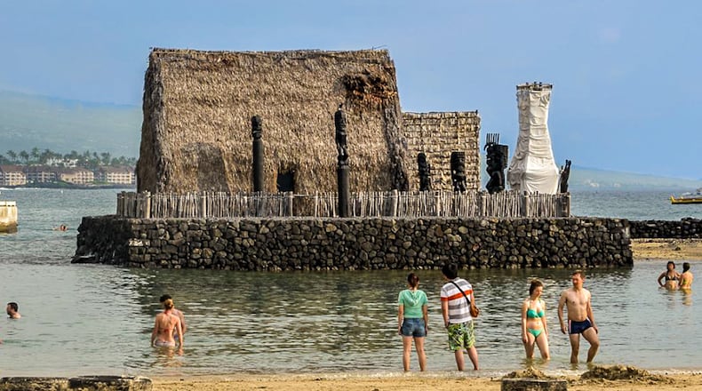 King Kamehameha lived out his last years in the thatched hut and Ahuena Heiau, now restored, in the bay next to the Courtyard King Kamehameha Kona Beach Hotel. (Steve Haggerty/TNS)