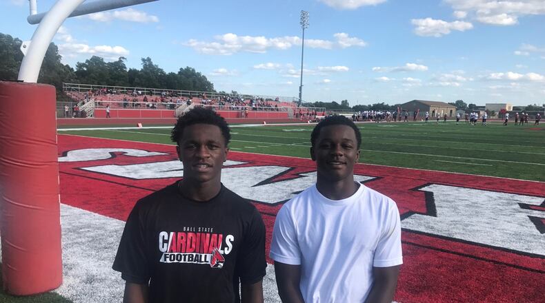 Brothers Hezekiah Hudson Davis (left) and Jeremiah Hudson Davis both freshman football players who will dress and play some for varsity at Trotwood Madison High this season after Rams practice Wednesday at the school’s football stadium. Tom Archdeacon/CONTRIBUTED