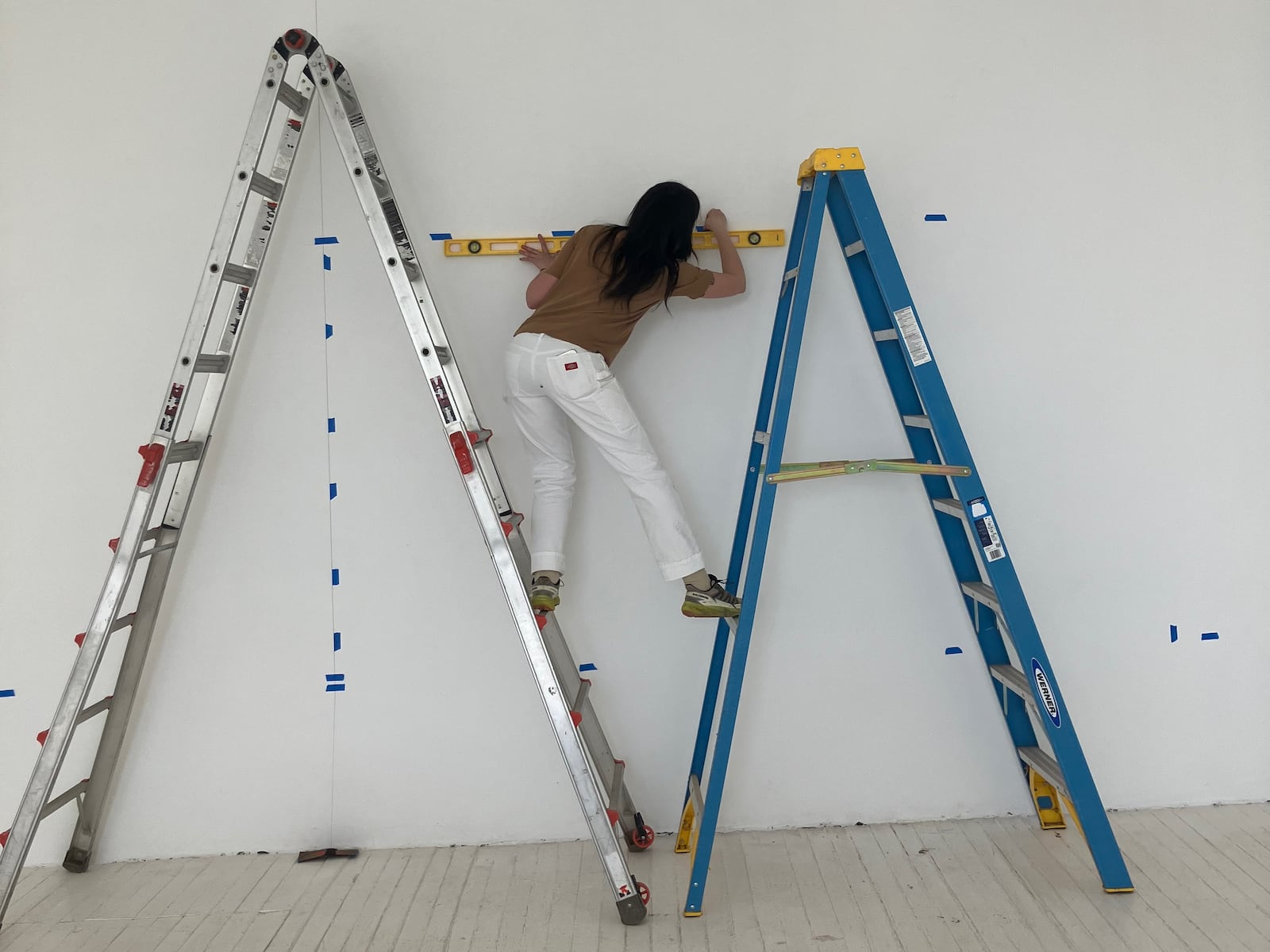 Muralist Atalie Gagnet executes her own designs and has also assisted artist Kate Shepherd in her New York gallery. “When I go up really high, it takes me a minute to adjust sometimes, and then I’m fine. I was taught how to use a ladder well. My brother always said, you’re not gonna fall," said Gagnet. CONTRIBUTED PHOTO