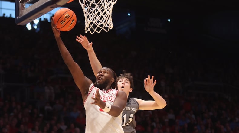 Dayton's Jaiun Simon scores against Davidson on Sunday, Feb. 15, 2026, at UD Arena. David Jablonski/Staff