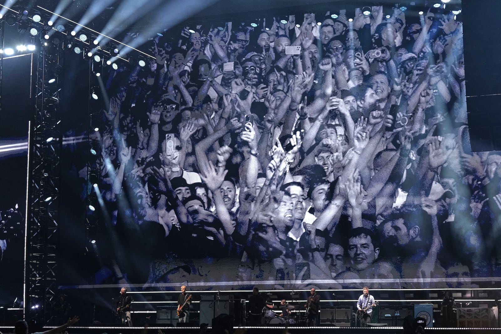 Oasis perform during their reunion concert on Friday, July 4, 2025, in Cardiff. (Photo by Scott A Garfitt/Invision/AP)