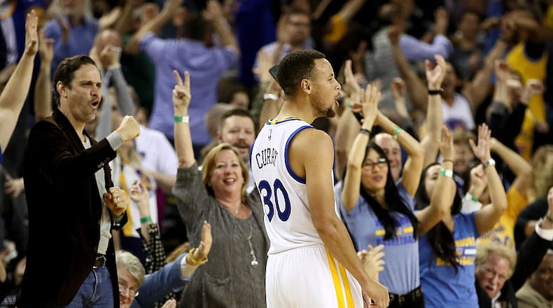 OAKLAND, CA - NOVEMBER 07: Stephen Curry #30 of the Golden State Warriors reacts after making his record breaking 13th three-pointer against the New Orleans Pelicans at ORACLE Arena on November 7, 2016 in Oakland, California. NOTE TO USER: User expressly acknowledges and agrees that, by downloading and or using this photograph, User is consenting to the terms and conditions of the Getty Images License Agreement. (Photo by Ezra Shaw/Getty Images)
