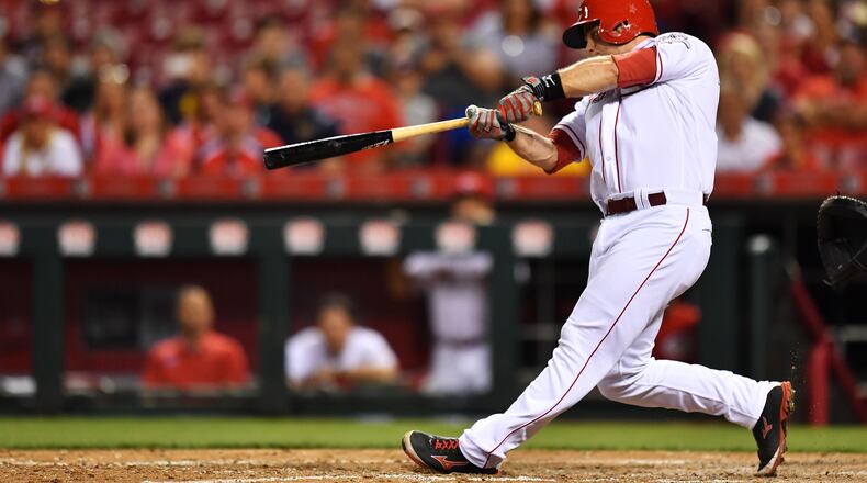Reds catcher Devin Mesoraco hits a walk-off home run in the tenth inning against the Braves at Great American Ball Park on June 2, 2017.. Stalled on the disabled list, he might be back in uniform soon.