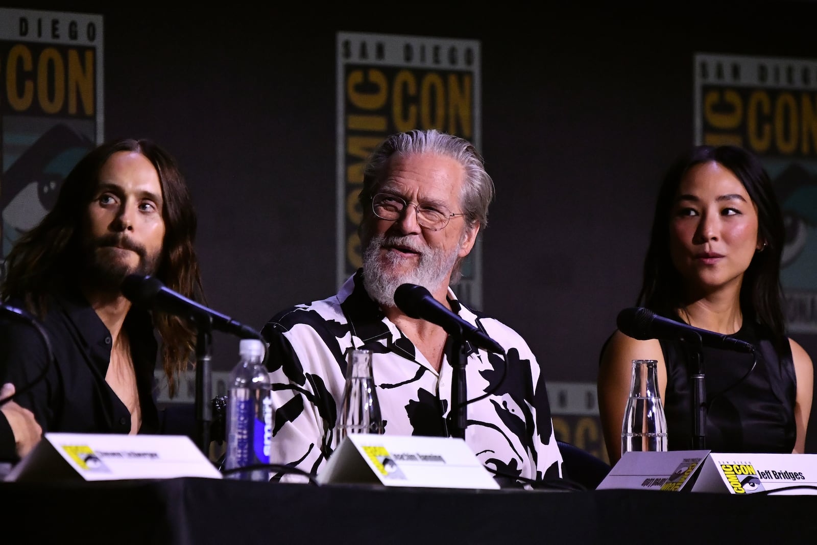 Jared Leto, from left, Jeff Bridges, and Greta Lee attend a panel for "Tron: Ares" during Comic-Con International on Friday, July 25, 2025, in San Diego. (Photo by Richard Shotwell/Invision/AP)