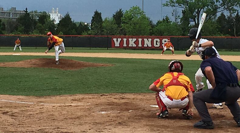 Fenwick pitcher C.J. Napier delivers a pitch to Cincinnati Hills Christian Academy’s Adam Rakestraw during Friday’s Division II district semifinal at Princeton. RICK CASSANO/STAFF