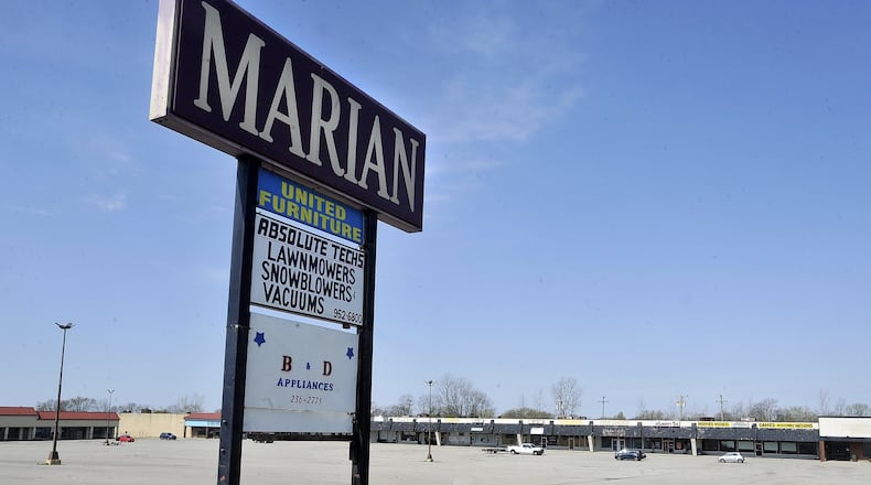 The city of Huber Heights purchased the Marian Shopping Center on Brandt Pike for $2.8 million. MARSHALL GORBYSTAFF