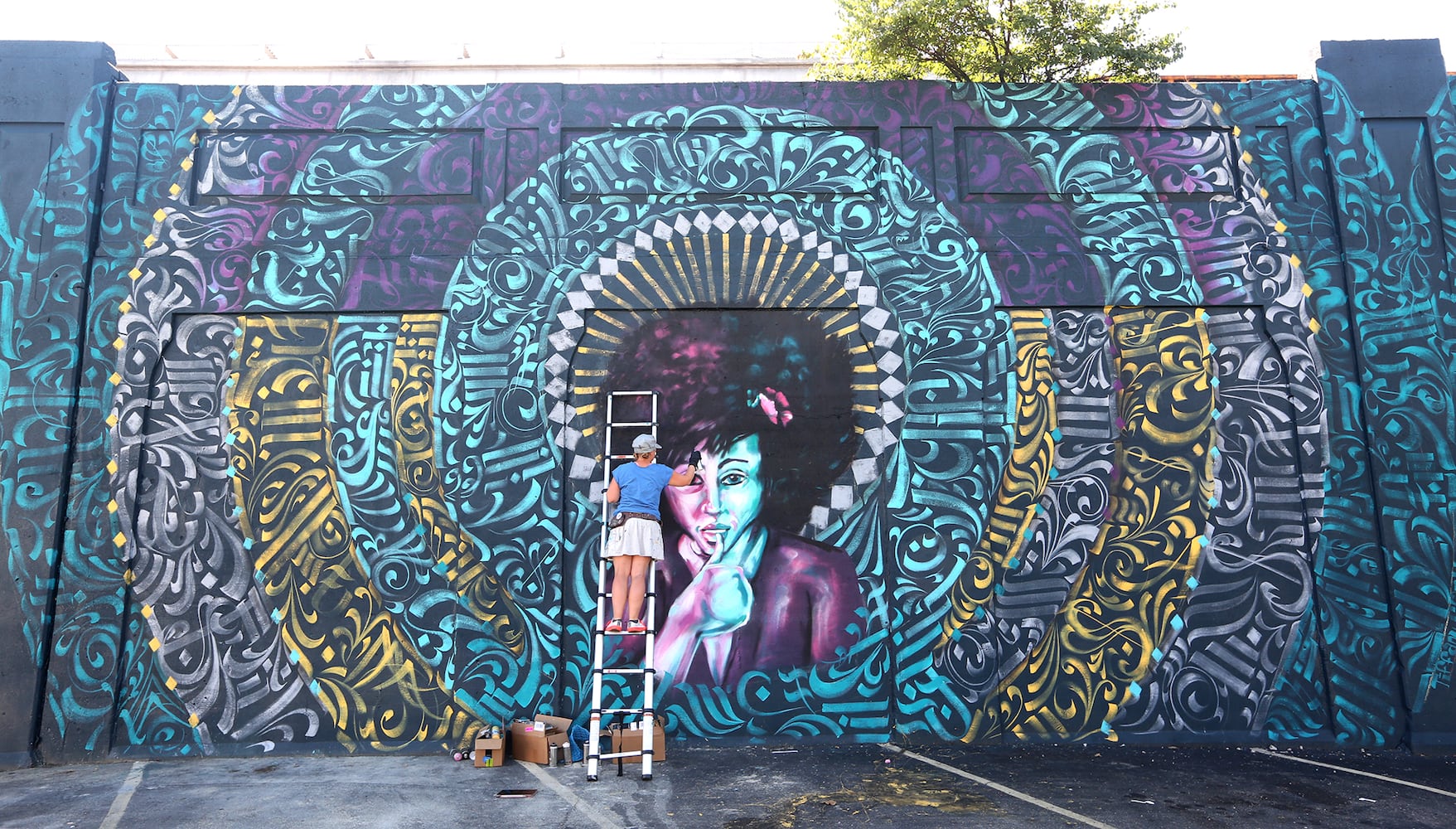 PHOTOS: New Dayton mural created in calligraffiti style with more than 20 colors