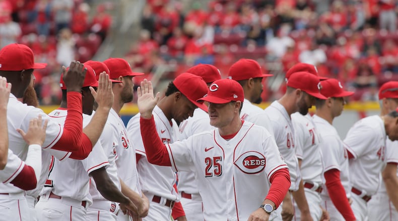 Reds manager David Bell is introduced before a game between the Reds and Guardians on Opening Day on Tuesday, April 12, 2022, at Great American Ball Park in Cincinnati. David Jablonski/Staff