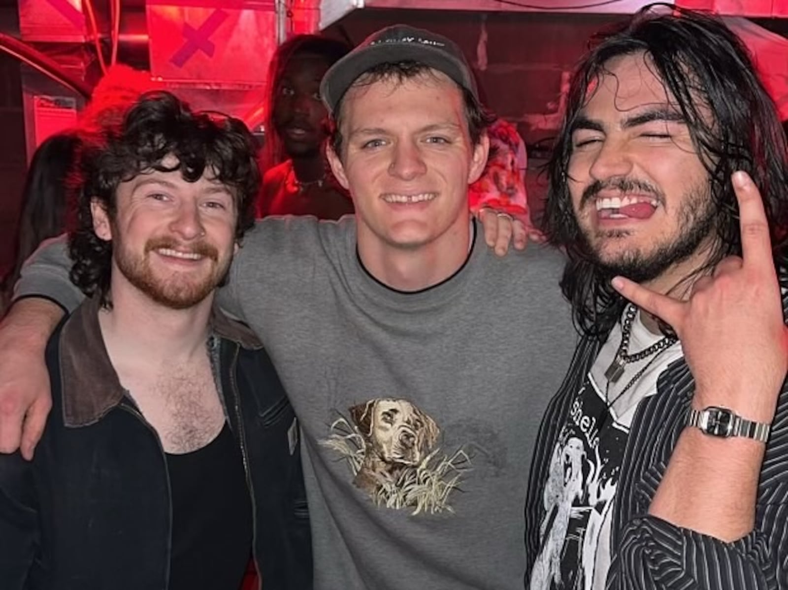 Max Lightcap (center) with friends at a show he promoted. “Throwing (DIY) shows is a huge group effort," he says. HANNAH KASPER/CONTRIBUTED